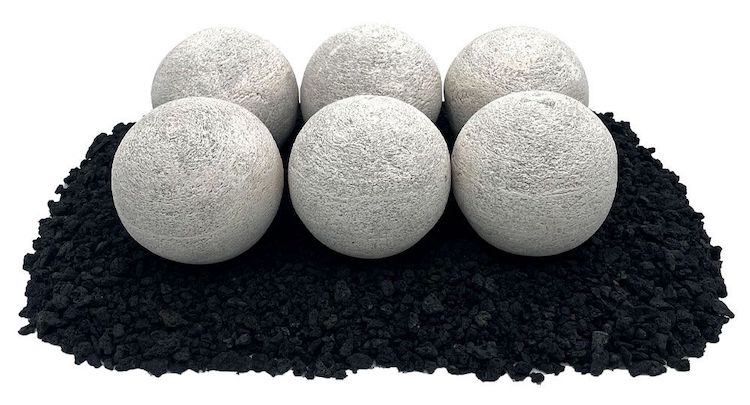 White Fire Pit Lite Stone Balls on a base layer of Lava Rock