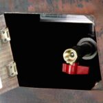 Access Door to ignition system on a copper fire bowl