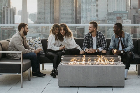 City Rooftop gathering around a Lightweight Concrete Fire Pit