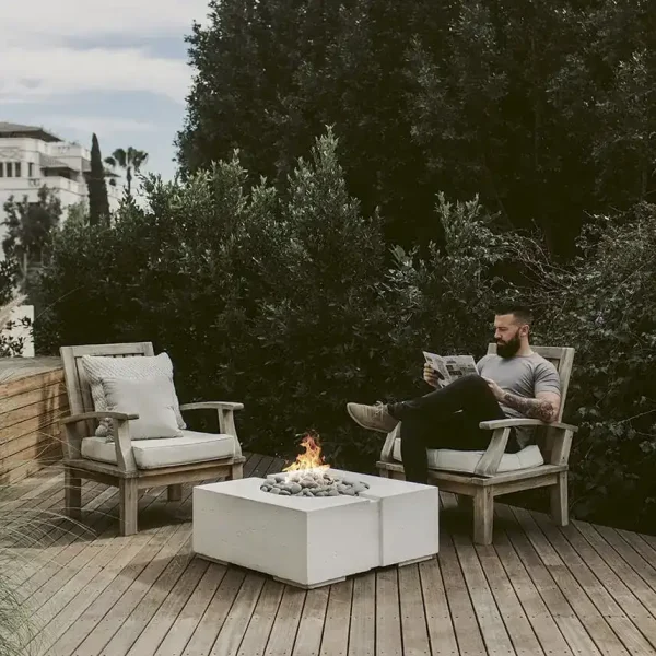 Bravo Concrete Fire Pit on a backyard deck