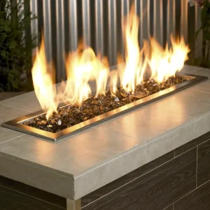 1/2 Inch Classic Fire Glass in Bronze Blue in a lit fire pit