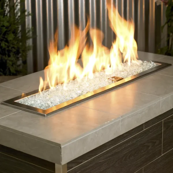 1/2 Inch Classic Fire Glass in Clear in a lit fire pit