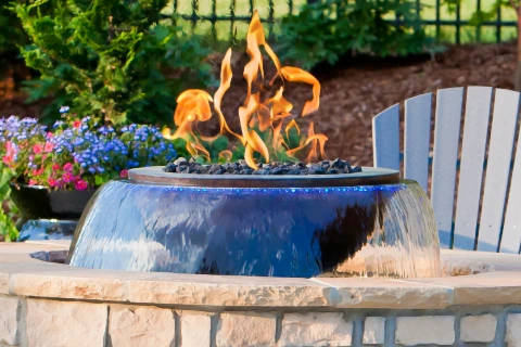 Copper Fire & Water Feature with 360 spill set in a backyard pool area