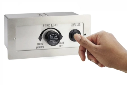Fire Pit push button ignition control panel showing a user pushing the button