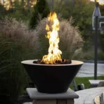 Mesa Copper Fire Bowl in a patio setting