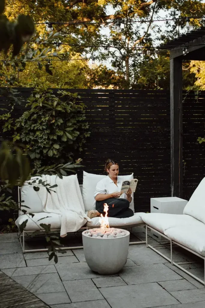 Element Fire Pit set in a backyard relaxed setting with seating
